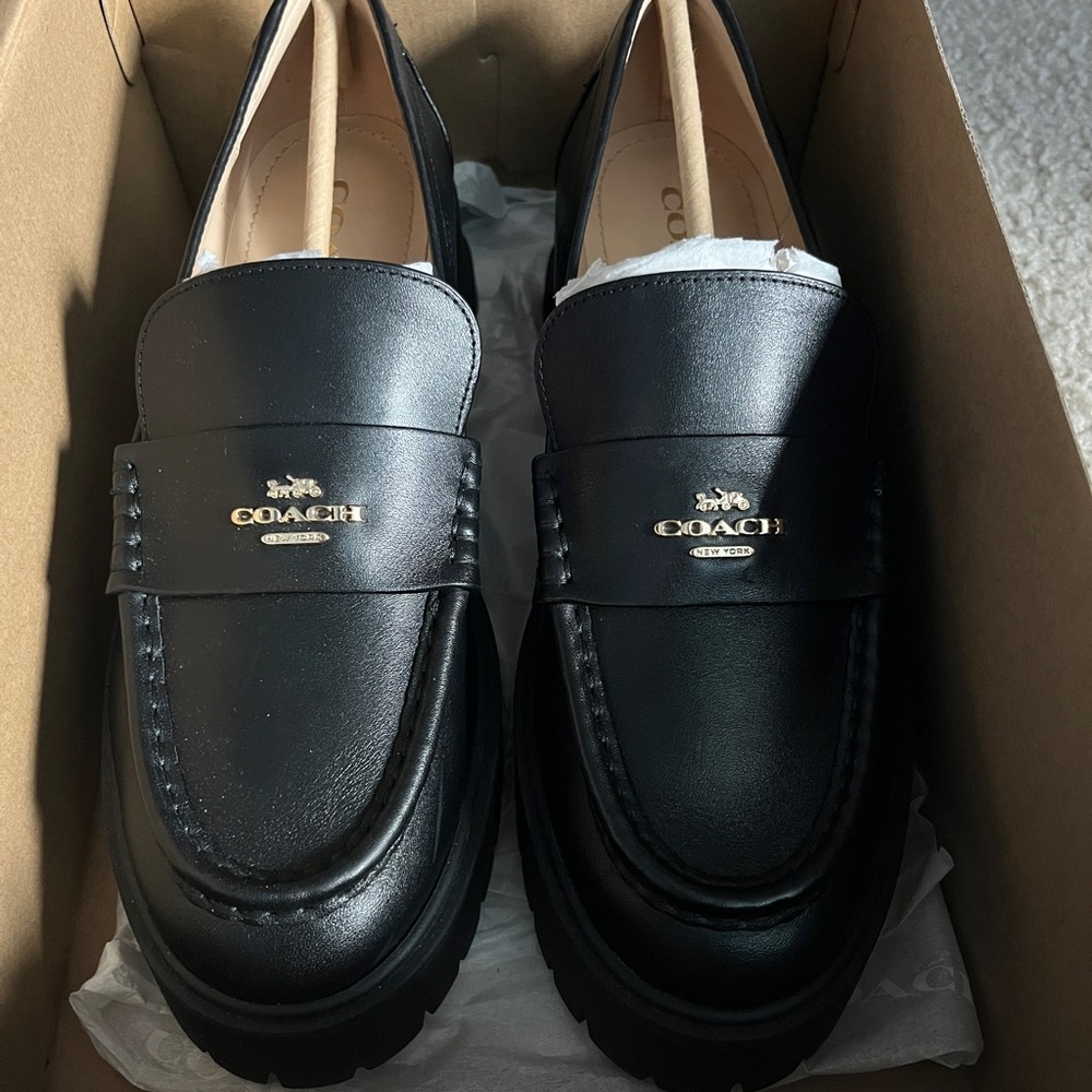 Coach Black Flats Sleek Leather Loafers